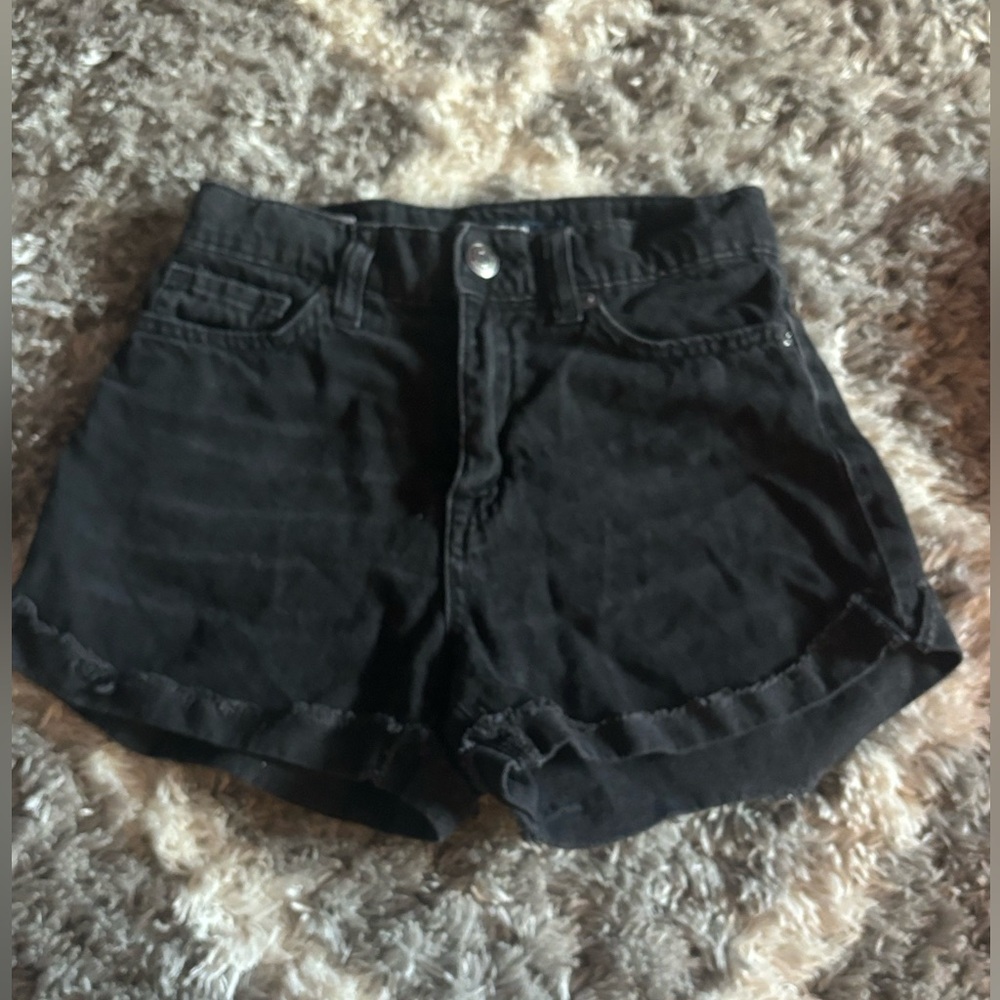 black ripped jean shorts